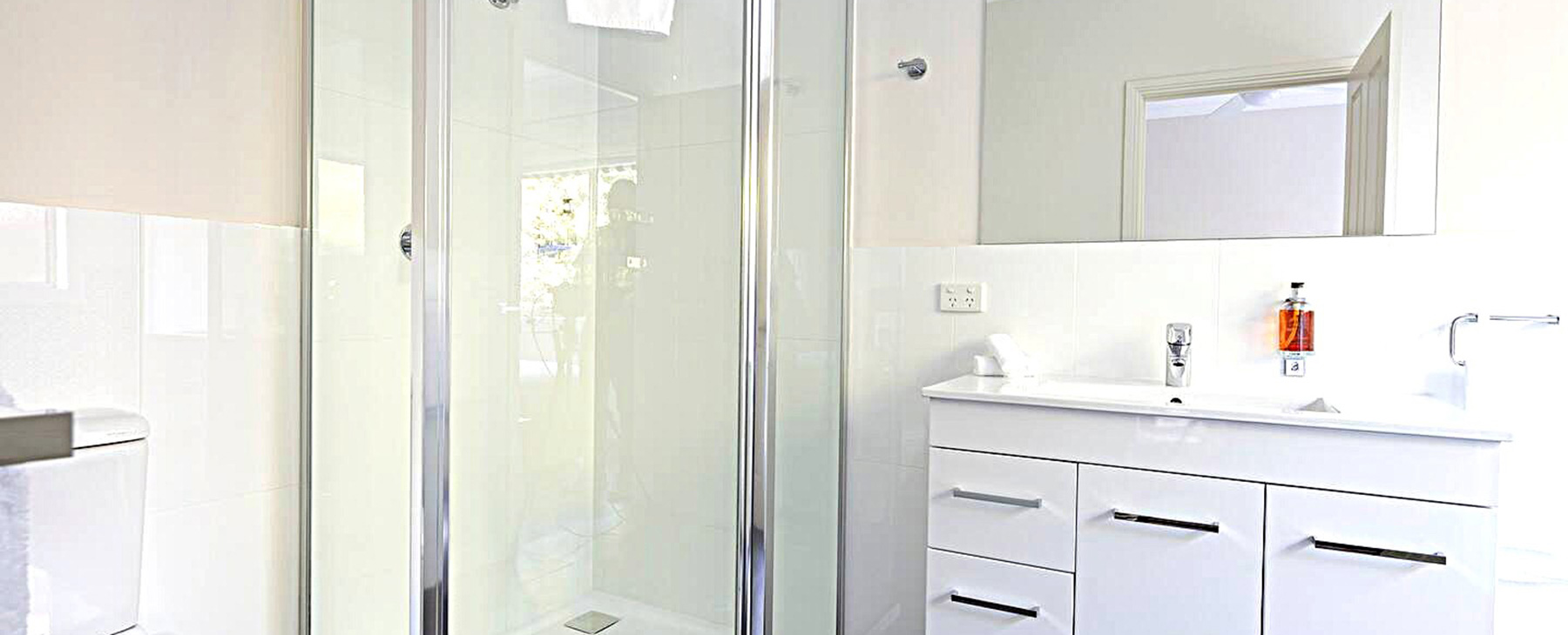 26aa.--Bedroom-1-separate-walk-in-shower-plus-a-bath-with-private-garden-views