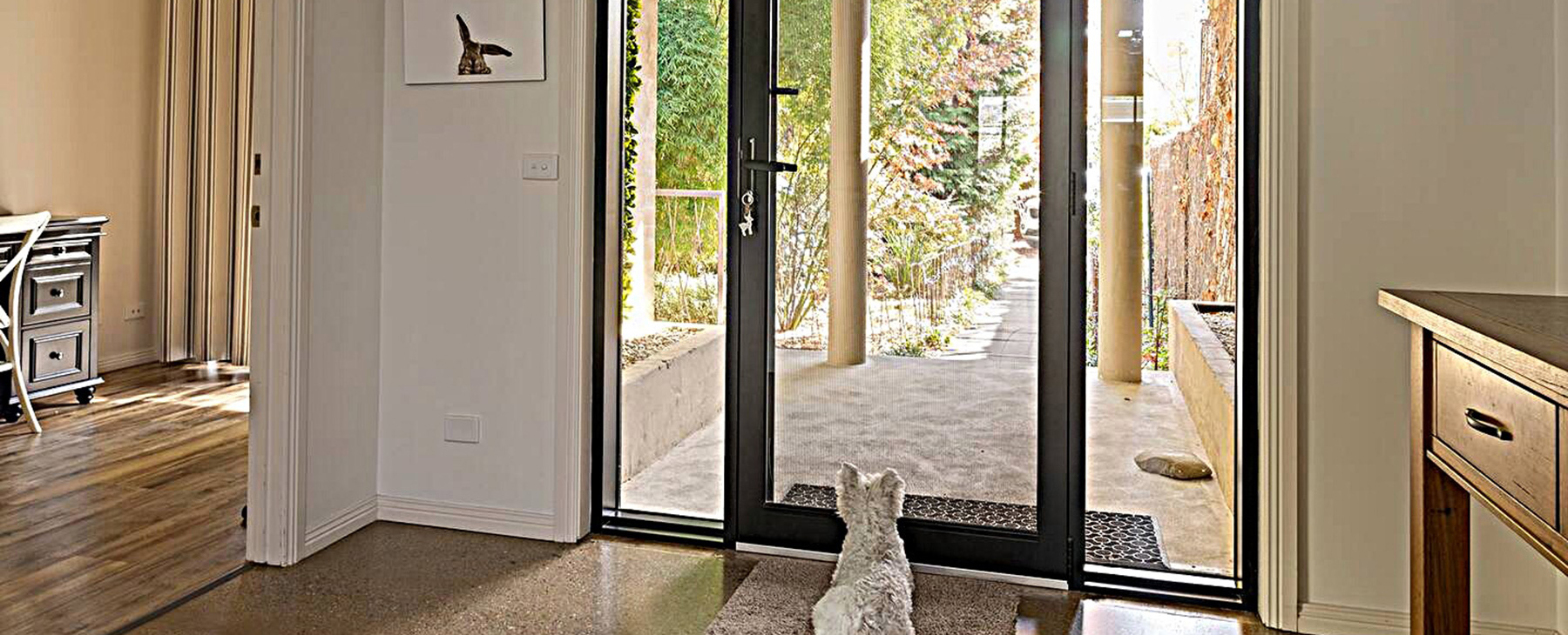 7a.--Looking-though-the-front-door-to-the-glorious-landscaped-front-entrance-path.