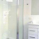 26aa.--Bedroom-1-separate-walk-in-shower-plus-a-bath-with-private-garden-views