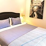 27a.--Bedroom-2-King-size-bed-with-ensuite-and-garden-outlook