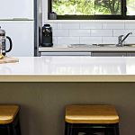 10a-New-kitchen-with-gas-cooking,-Nespresso-coffee-machine,-full-fridge-and-outlook-to-BBQ-and-back-garden